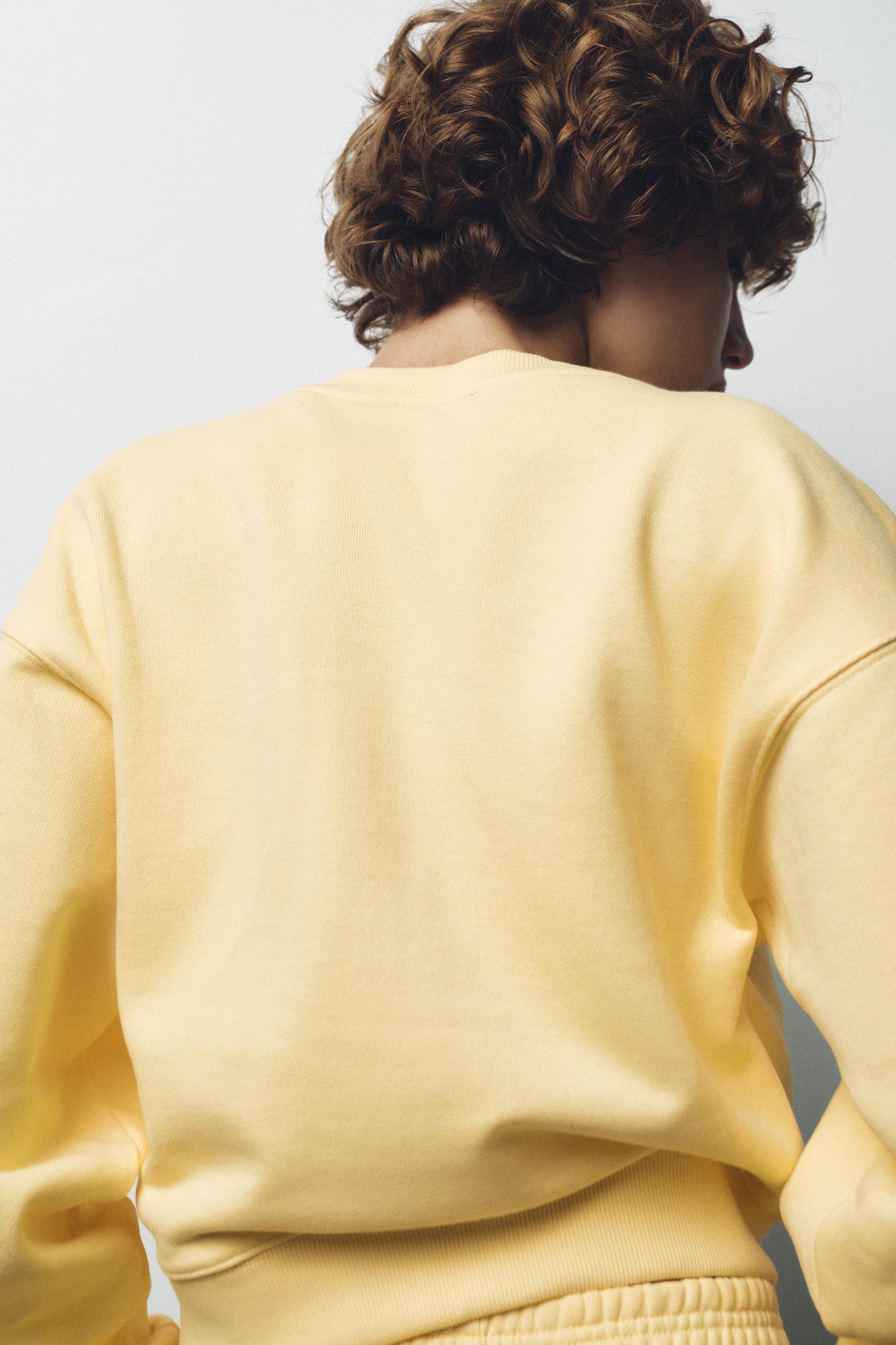 EMBROIDERED TEXT PLUSH SWEATSHIRT